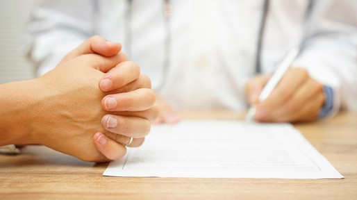 hands of Concerned Women for medical report written by doctor