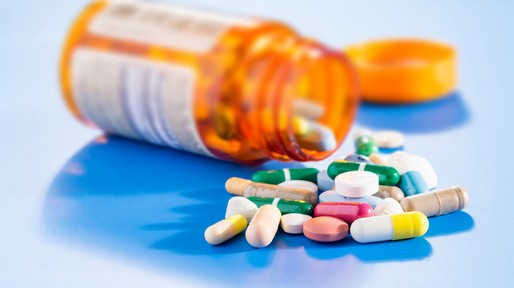 Pills and capsules in medical vial