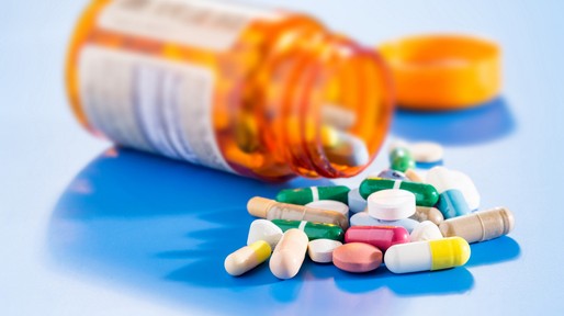 Pills and capsules in medical vial