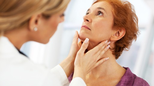 Female doctor examining her patient.
