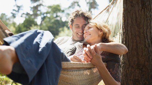 Couple sitting in hammock