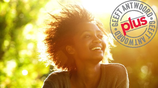 beautiful-african-american-woman-smiling-with-sunset-picture-id522324004_1